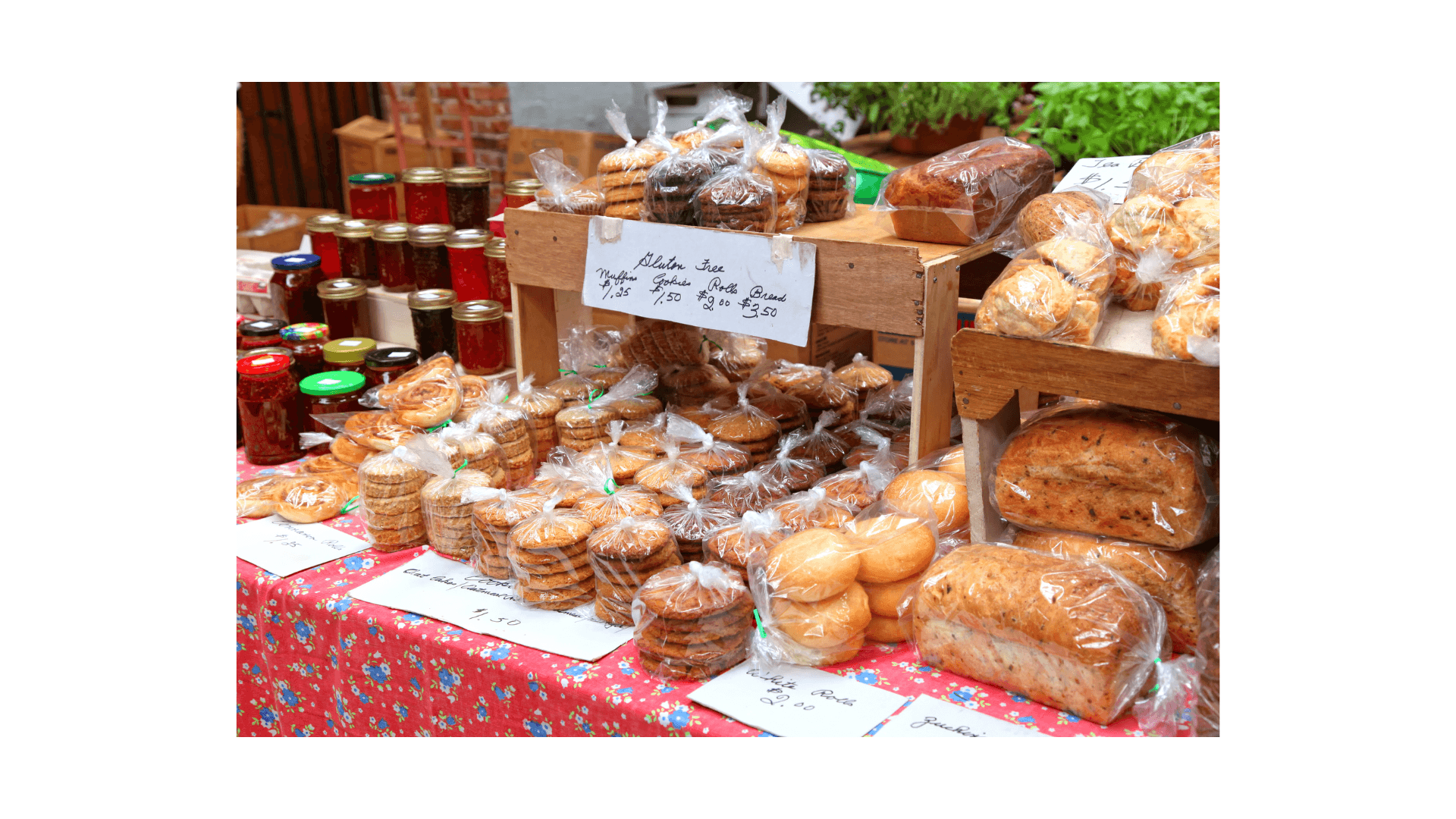 A market stall with fresh baked goods and preserves